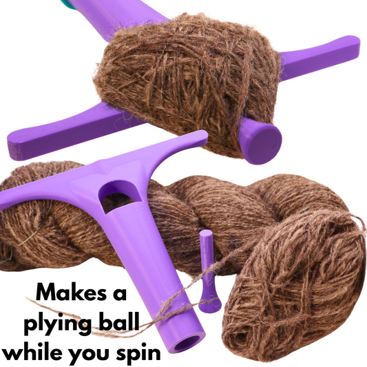 text reads 'makes a plying ball while you spin'. Picture features a plying druga reel and peg against a spun skein of grey yarn and a plying ball. Above it features a plying reel in use, complete with yarn wrapped around the peg. 