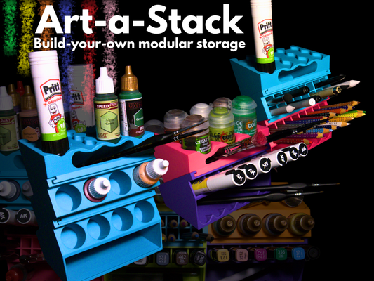 Art-a-Stack modular storage system with stationery items on a dark background