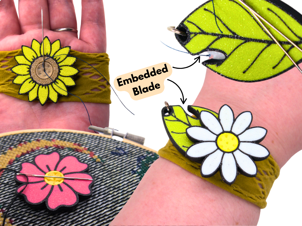 flower and leaf-shaped sewing tool that can be used as a palm thimble, needle minder, wrist pin cushion and a thread cutter