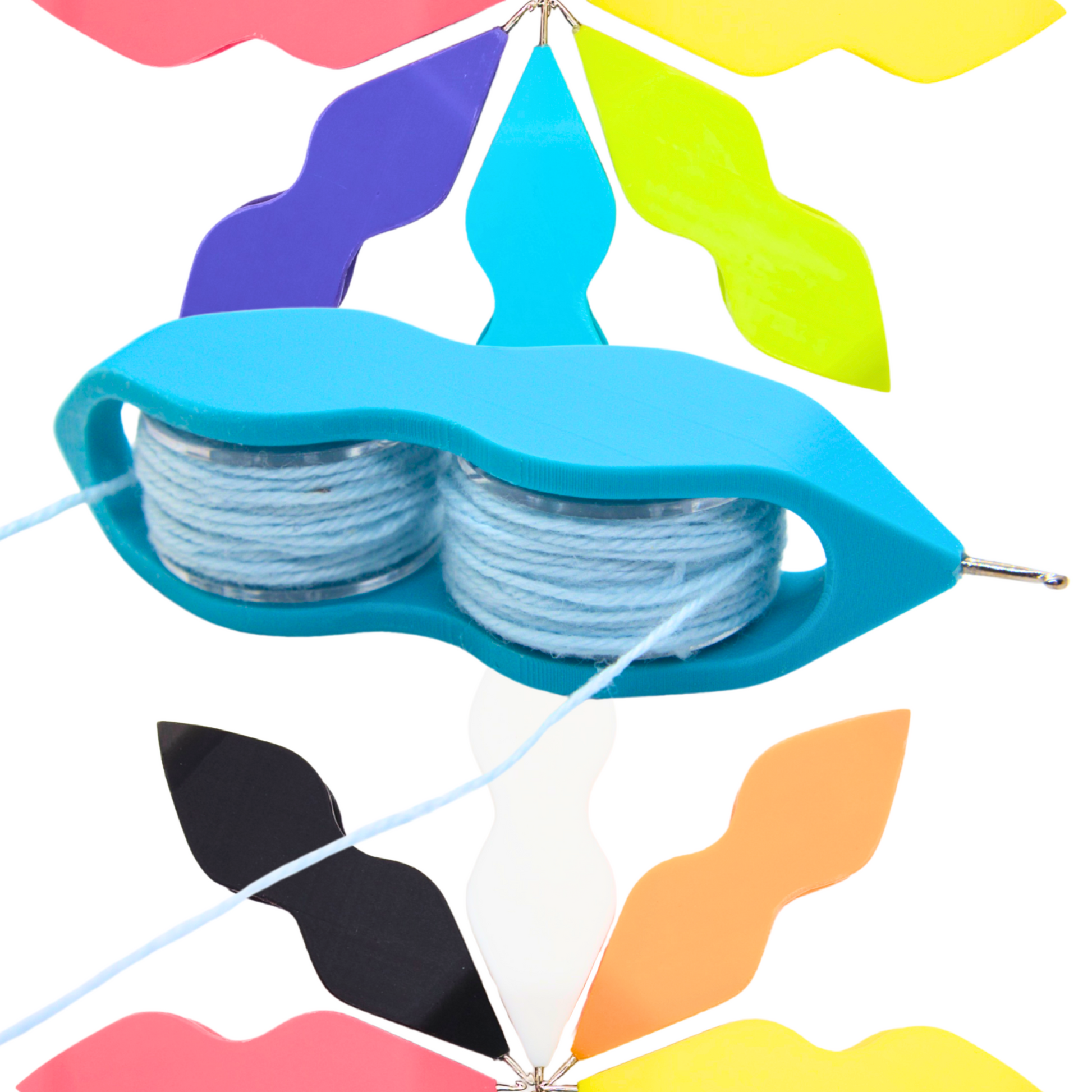 Colorful blue double bobbin duet tatting shuttle with two sewing machine bobbins in
