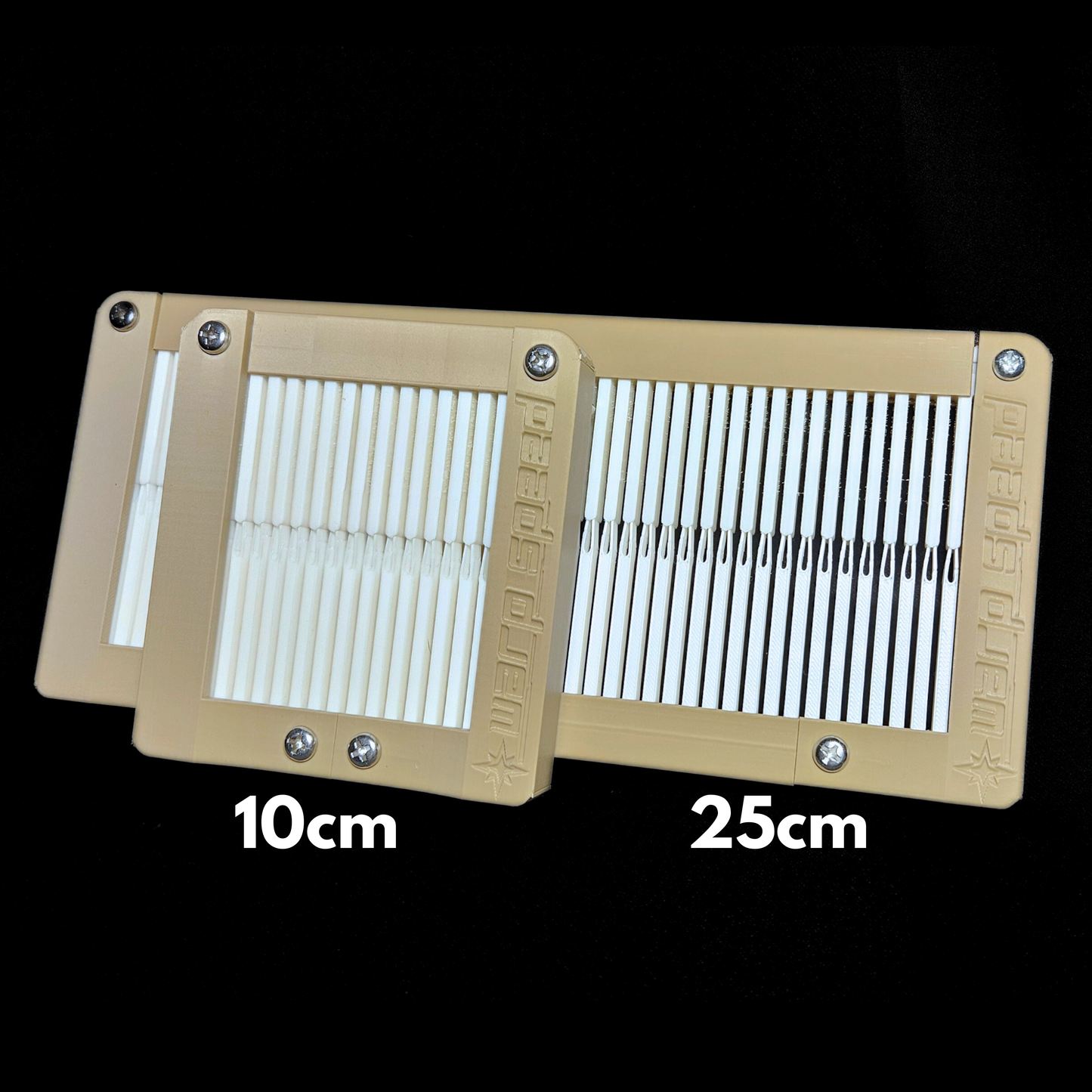 Two rigid weaving heddles with measurements '10cm' and '25cm' on a black background