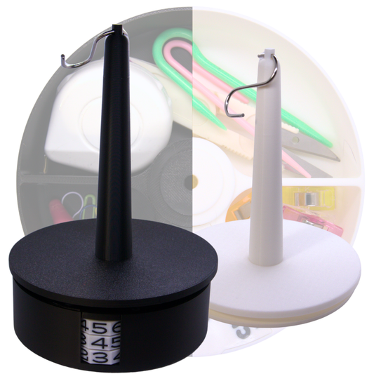Black and white yarn holder and spinner with a faded picture of the internal storage full of yarn tools 