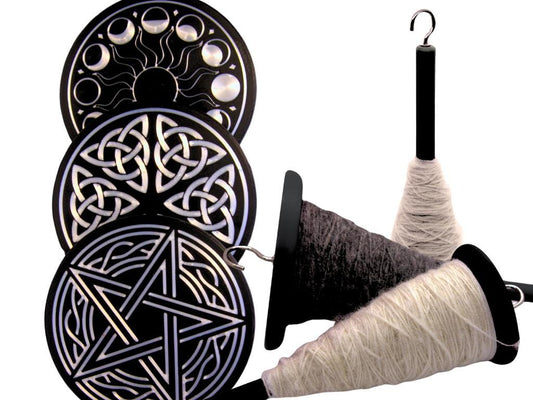 Embellished drop spindle with yarn and Celtic knot designs on a white background